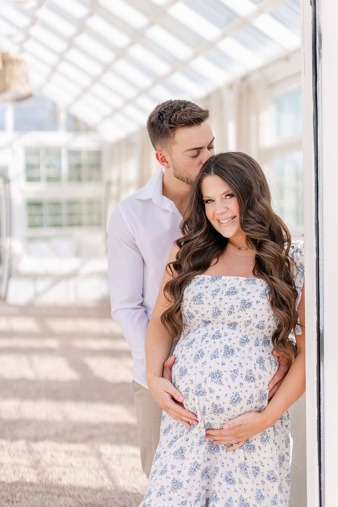 during their Charlotte NC Greenhouse Maternity Session | Image by Chrissy Winchester 