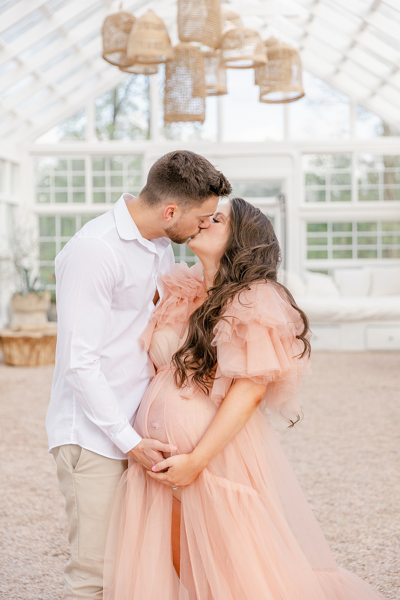 during their Charlotte NC Greenhouse Maternity Session | Image by Chrissy Winchester 