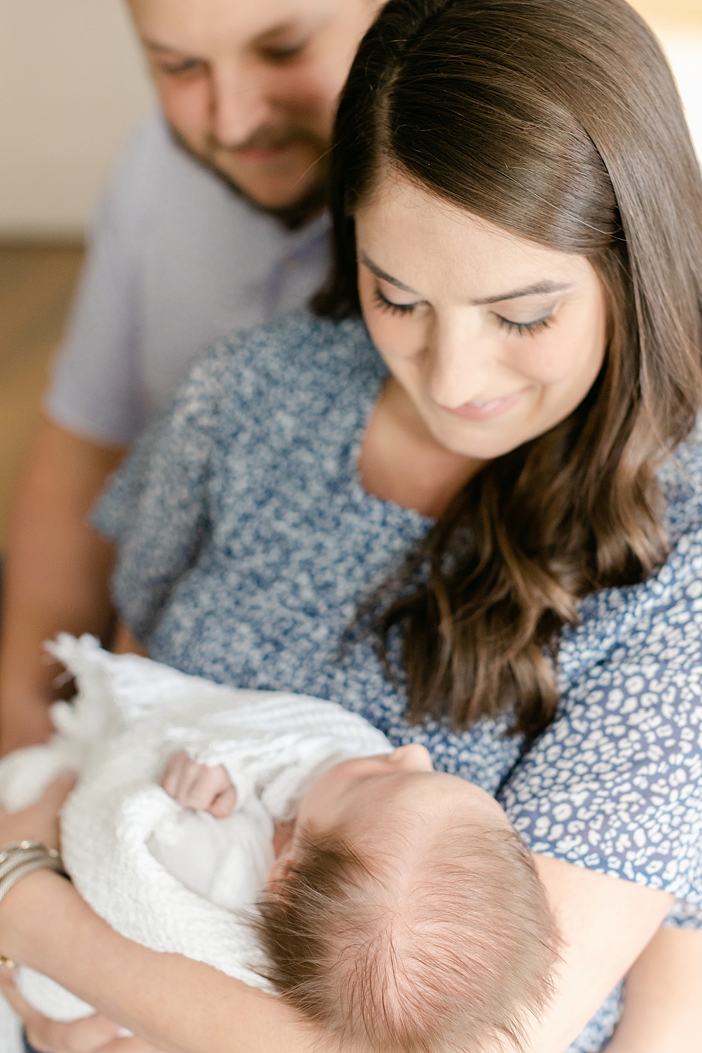 during their Charlotte In Home Newborn Session | Image by Chrissy Winchester 