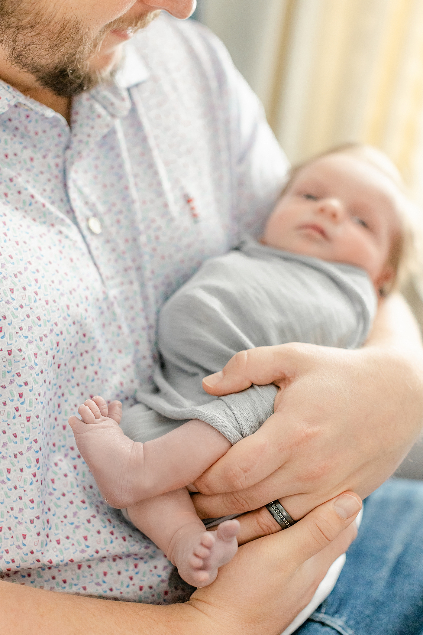 during their Charlotte In Home Newborn Session | Image by Chrissy Winchester 