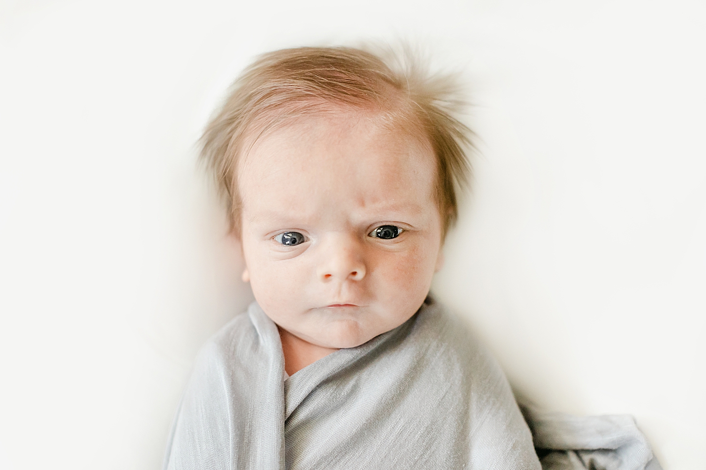 during their Charlotte In Home Newborn Session | Image by Chrissy Winchester 