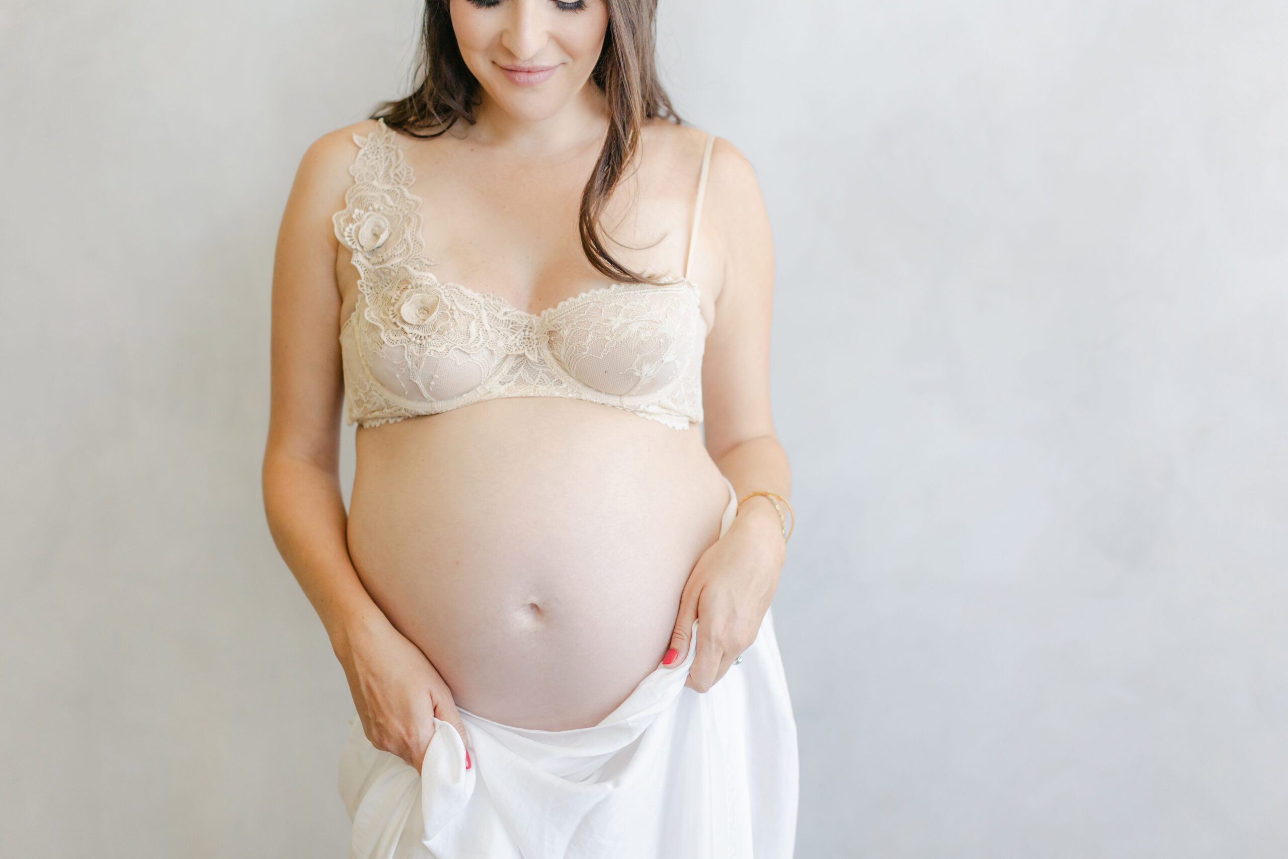 lace and satin pregnant belly shot