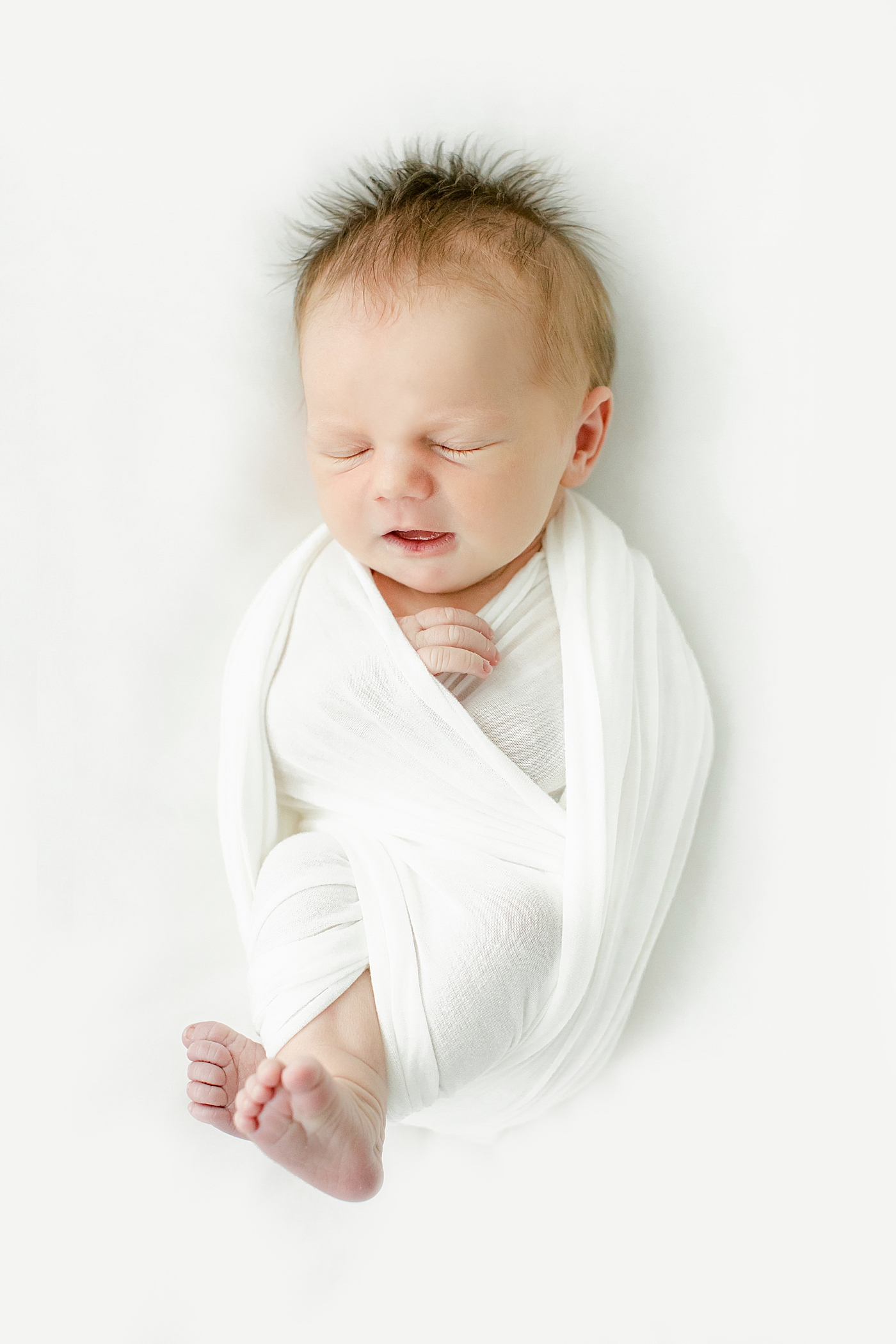 during baby girl newborn session | Image by Chrissy Wincherster Photography