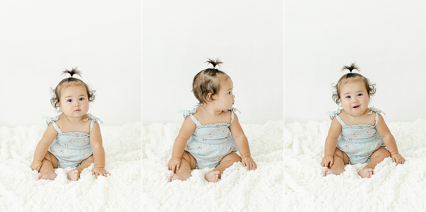 Detail images of baby girl in a blue jumper | Image by Chrissy Winchester Photography