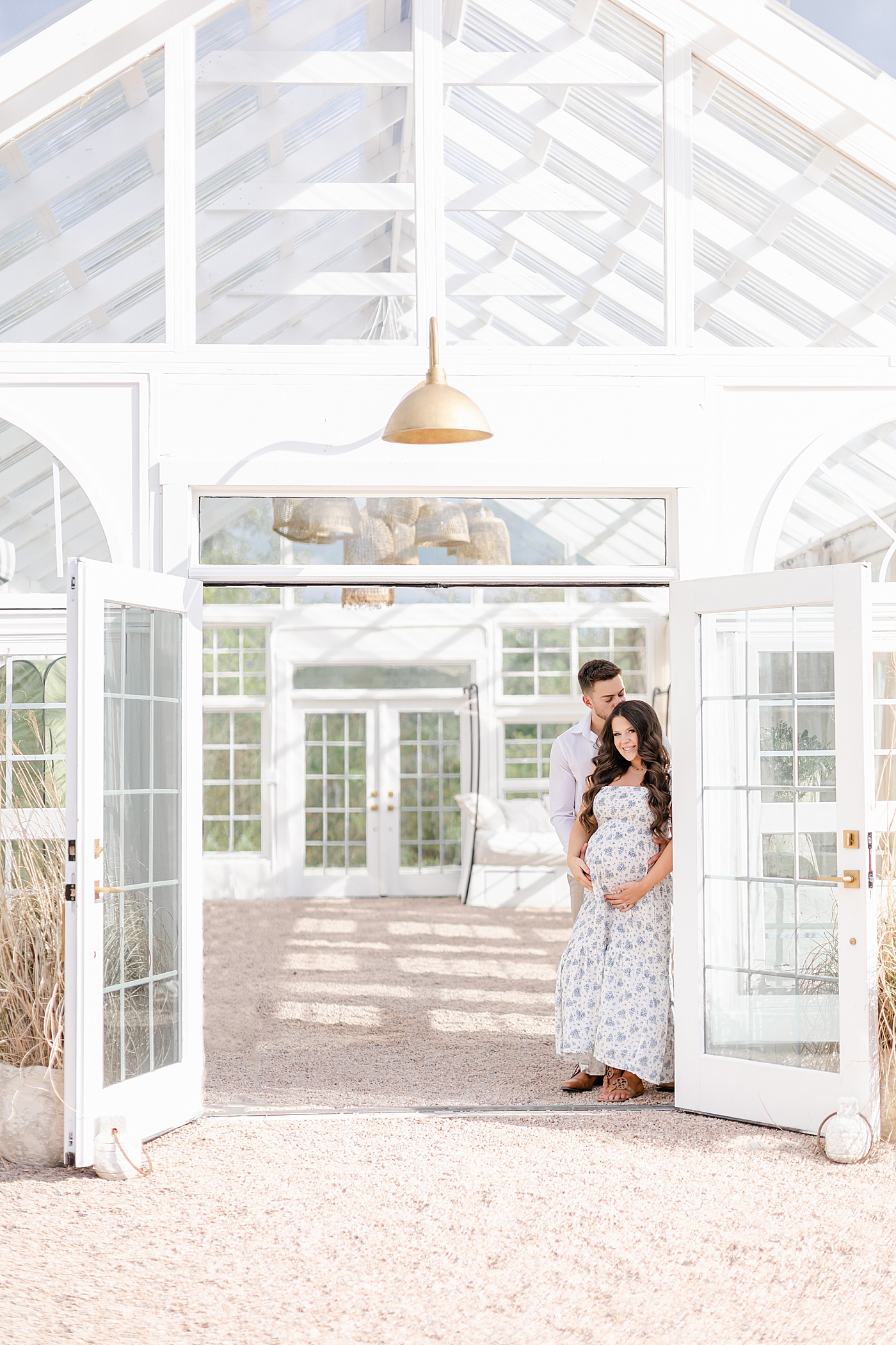 during their Charlotte NC Greenhouse Maternity Session | Image by Chrissy Winchester 