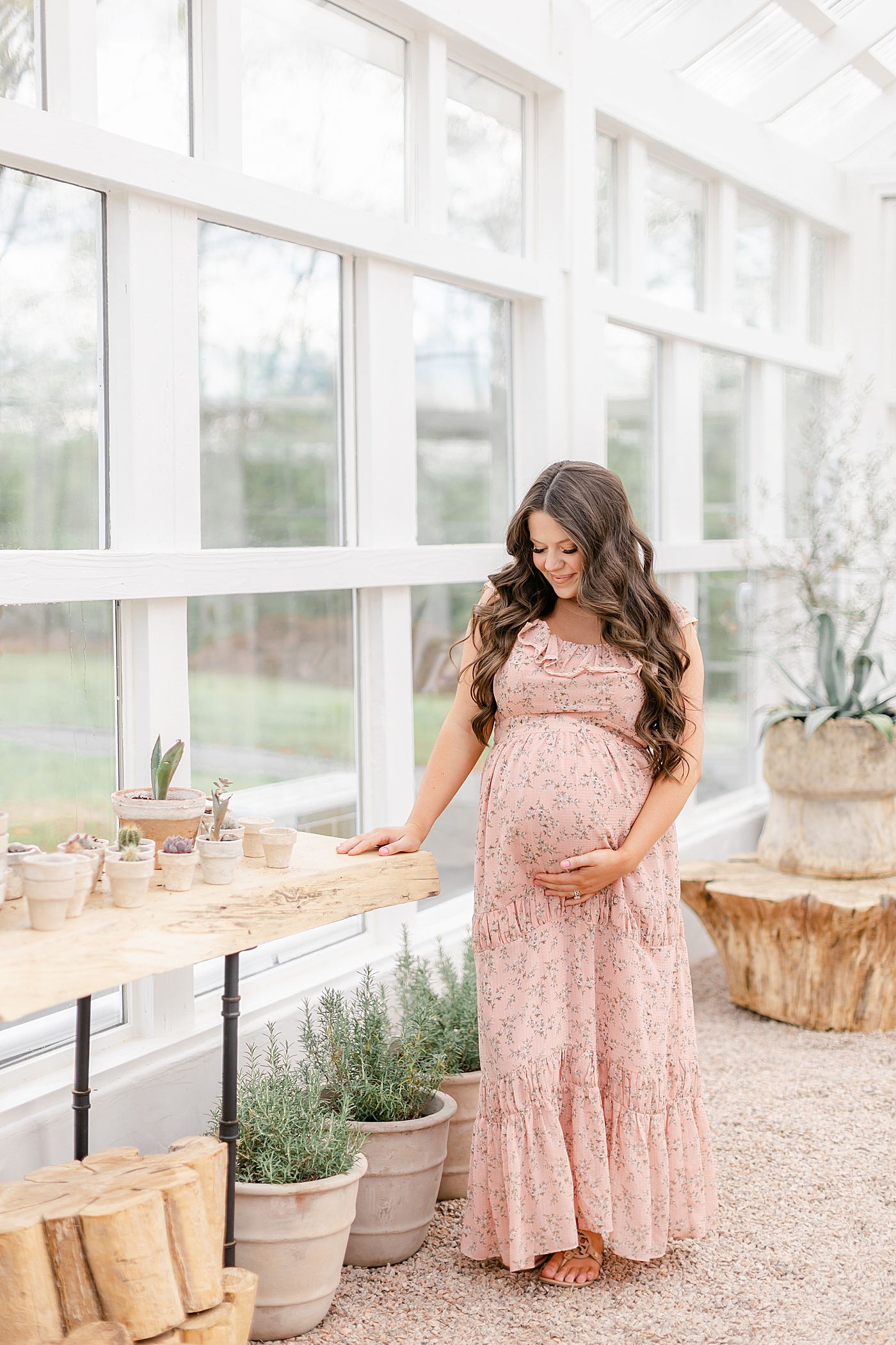 during their Charlotte NC Greenhouse Maternity Session | Image by Chrissy Winchester 